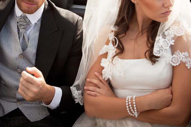 <p>Chev Wilkinson/Getty</p> A groom and bride (stock image)