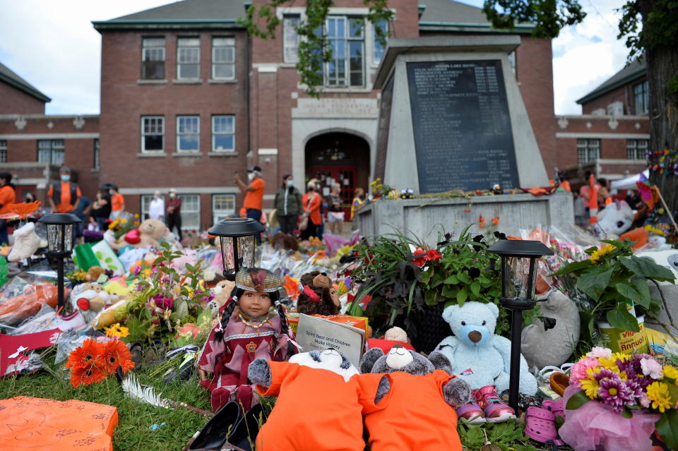 A memorial on the grounds of the former Kamloops Indian Residential School is seen after the remains of 215 children, some as young as three years old, were found at the site in Kamloops, British Columbia, Canada June 5, 2021.  REUTERS/Jennifer Gauthier     TPX IMAGES OF THE DAY