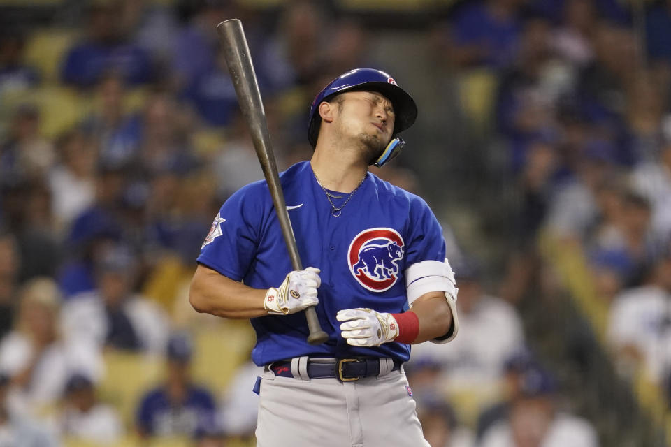 Chicago Cubs' Seiya Suzuki (27) reacts after a strike call during the fourth inning of a baseball game against the Los Angeles Dodgers in Los Angeles, Friday, July 8, 2022. (AP Photo/Ashley Landis)