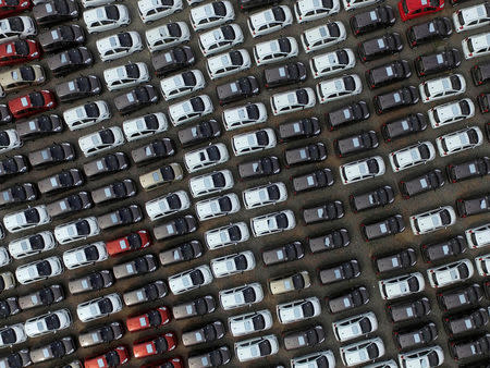 Electric cars are seen at a parking lot of an automobile factory in Xingtai, Hebei province, China April 26, 2016. REUTERS/Stringer/Files