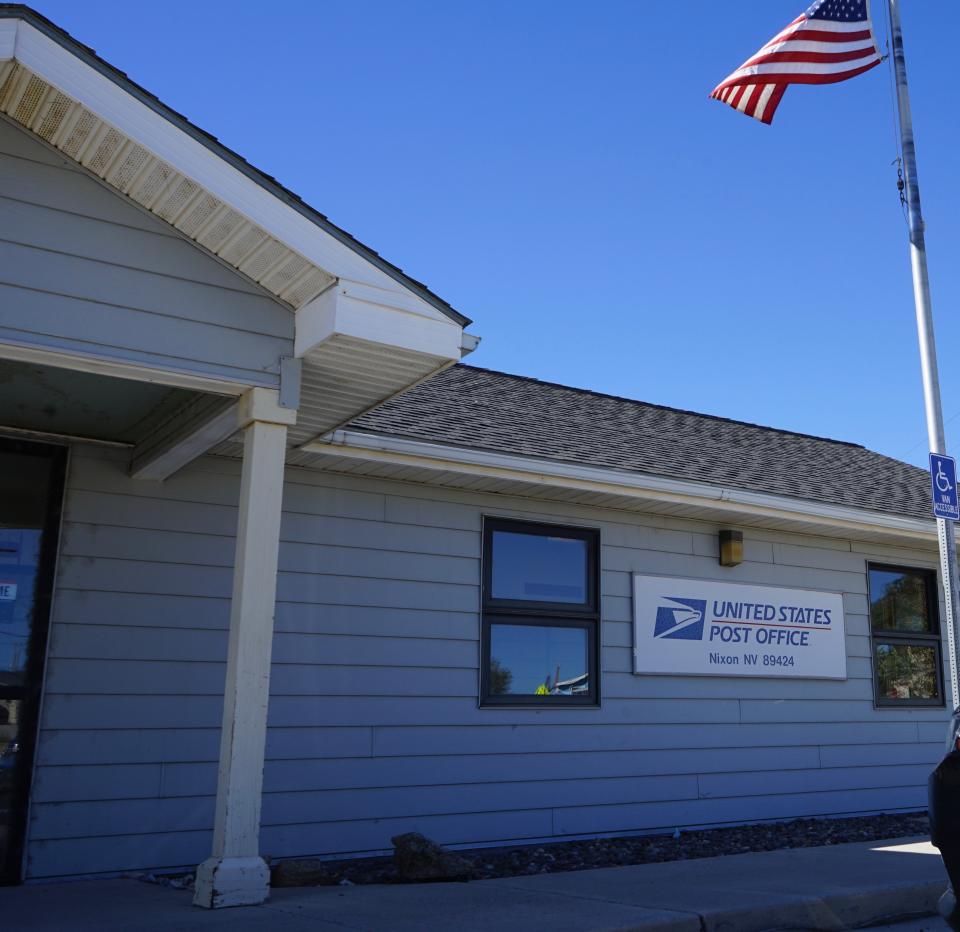 The U.S. Post Office in Nixon, Nev. is seen on Tuesday, Sept. 8, 2020. The majority of the more than 1,300 Pyramid Lake Paiute tribal members receive their mail in shared P.O. boxes at the reservation’s sole U.S. Post Office in Nixon, Nev., which is only open from 11:00 a.m. to 3:30 p.m. Post offices on tribal lands will play an integral role in ensuring Native Americans can access voting in Nevada and elsewhere in the U.S. West in the 2020 election, but advocates worry residents of sprawling, rural reservations who lack transportation may struggle to get to the post office. (AP Photo/Sam Metz)