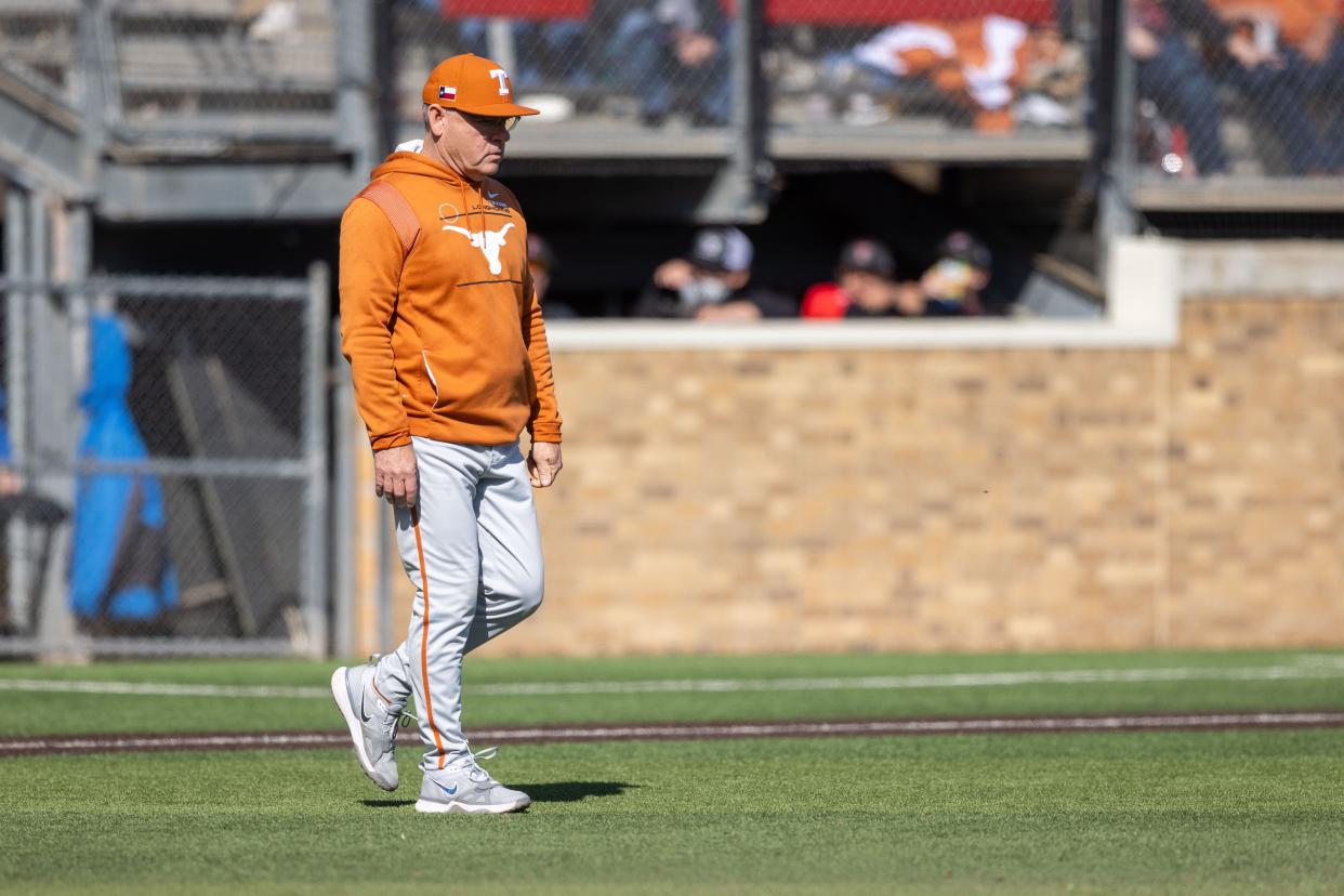 Texas head baseball coach David Pierce visits the mound in game two of the Big 12 baseball series against Texas Tech, Saturday, March 9, 2024, at Rip Griffin Park.