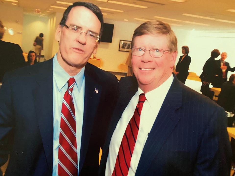 U.S. District Judge John Roll, left, with Rick Weare, a longtime chief federal courts administrator.