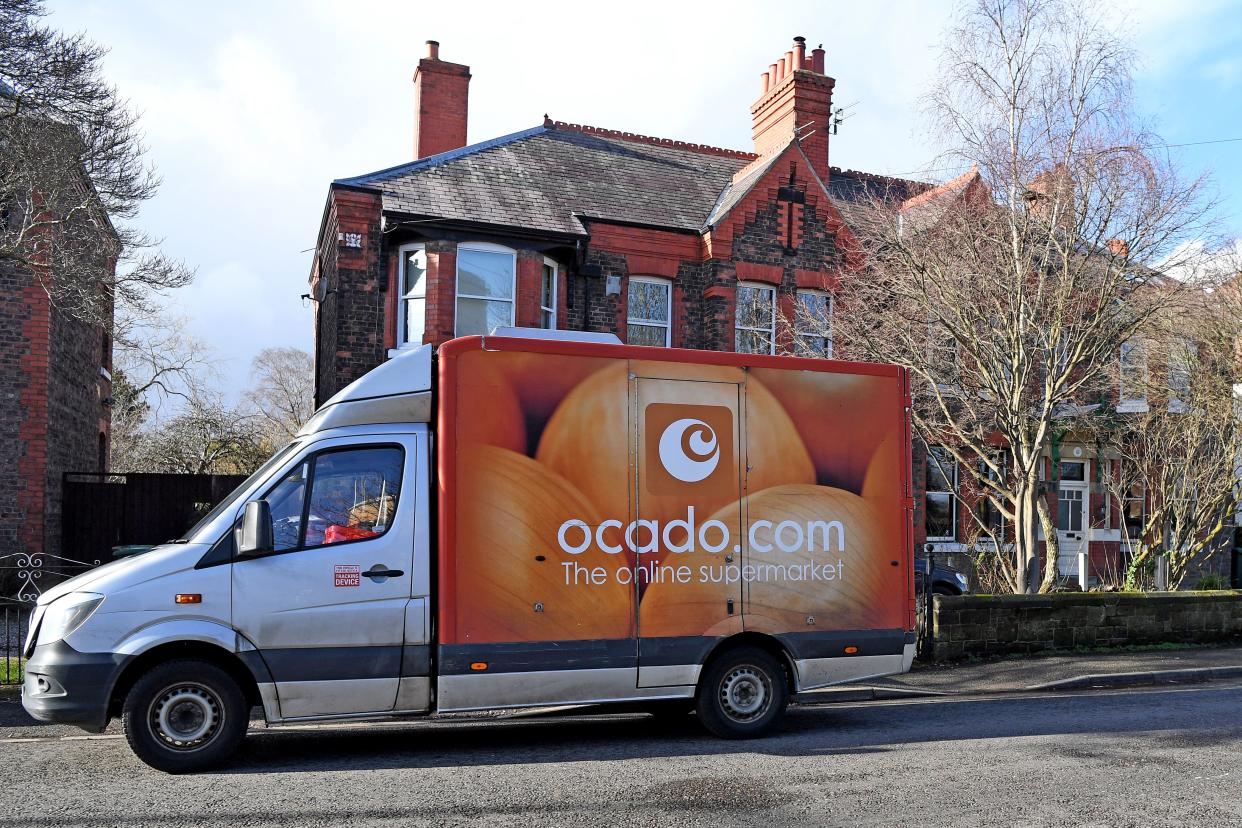 An Ocado delivery van parks outside a residential address near Liverpool in north west England, on February 10, 2019, during a delivery of food and drink for supermarket Waitrose. (Photo by Paul ELLIS / AFP)        (Photo credit should read PAUL ELLIS/AFP/Getty Images)