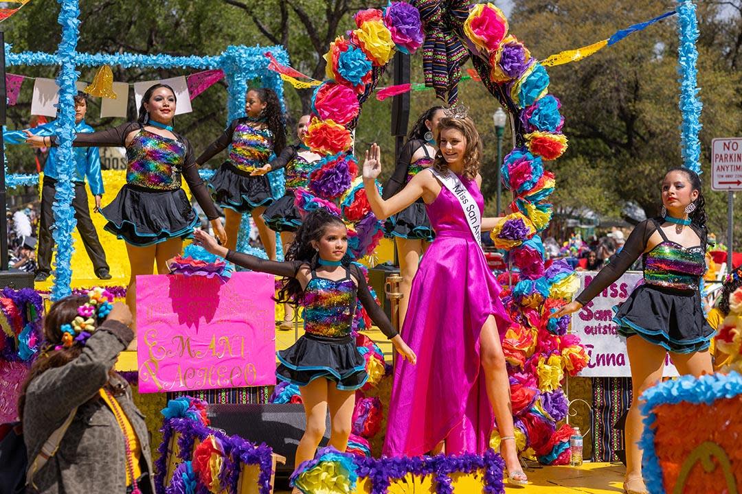 The Battle of the Flowers Parade float carrying Miss San Antonio