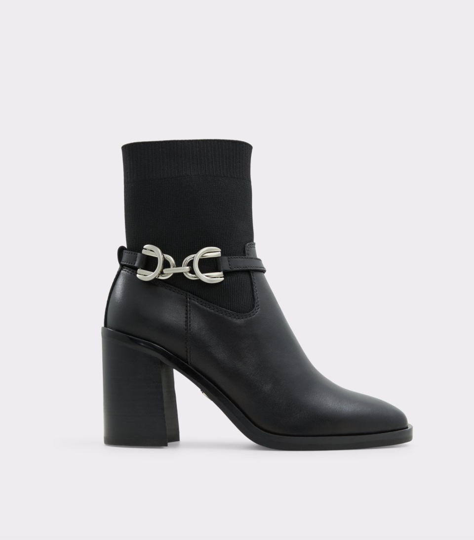 black leather chelsea boots with silver chain accessory, Wylaclya Chelsea Boots (Photo via Aldo)