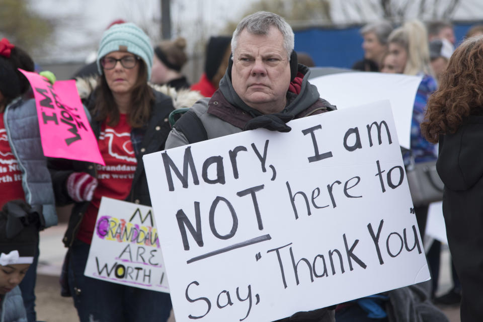 <p>Dennis Gentry holds a protest sign pointedly not thanking Oklahoma Gov. Mary Fallin, who said teachers should come to the Capitol to thank her for a recent raise, during a rally on April 2, 2018, in Oklahoma City. (Photo: J Pat Carter/Getty Images) </p>