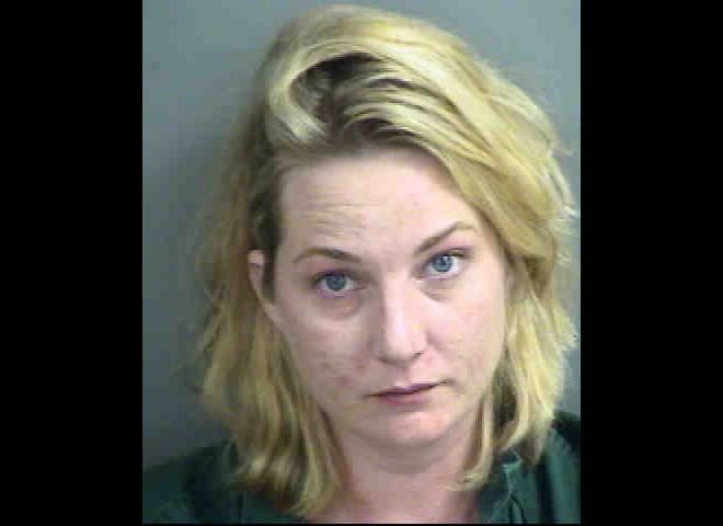 Police say that Patricia Libby was under the influence when repeatedly crashed her car into another vehicle in the parking lot of a Marco Island, Fla. elementary school where her children are enrolled. 