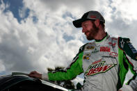 DAYTONA BEACH, FL - FEBRUARY 19: Dale Earnhardt Jr., driver of the #88 Diet Mountain Dew/National Guard Chevrolet, gets out of his car during qualifying for the NASCAR Sprint Cup Series Daytona 500 at Daytona International Speedway on February 19, 2012 in Daytona Beach, Florida. (Photo by Jared C. Tilton/Getty Images for NASCAR)