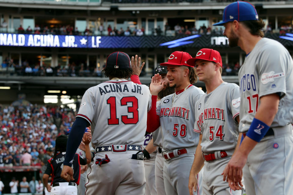 CLEVELAND, OH - JULY 09:  Ronald Acuna Jr. #13 of the Atlanta Braves is greeted by teammates during player introductions prior to the 90th MLB All-Star Game at Progressive Field on Tuesday, July 9, 2019 in Cleveland, Ohio. (Photo by Adam Glanzman/MLB Photos via Getty Images)