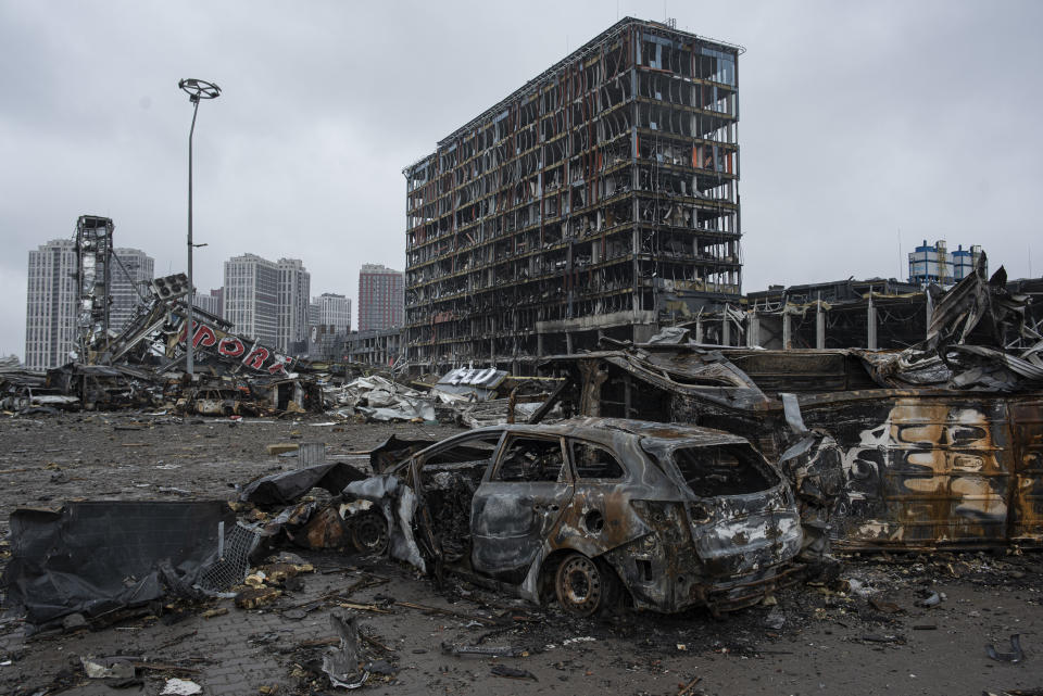 Burned cars in the parking lot of the Retroville trade center in Kyiv.