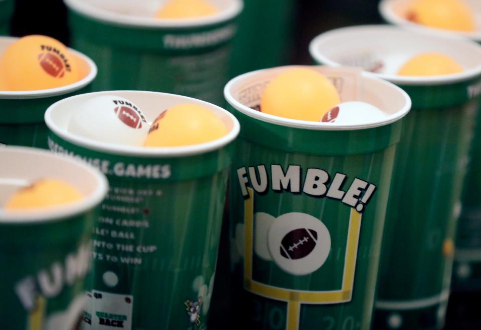 Daphne Moore “really wanted to do like thunderbolts coming down” from the top of the cup on the label for the game Fumble! that she invented with her brother. “We added those and then we looked at it but it was like kind of too much and we had to take them off, and I was really sad,” Daphne said.