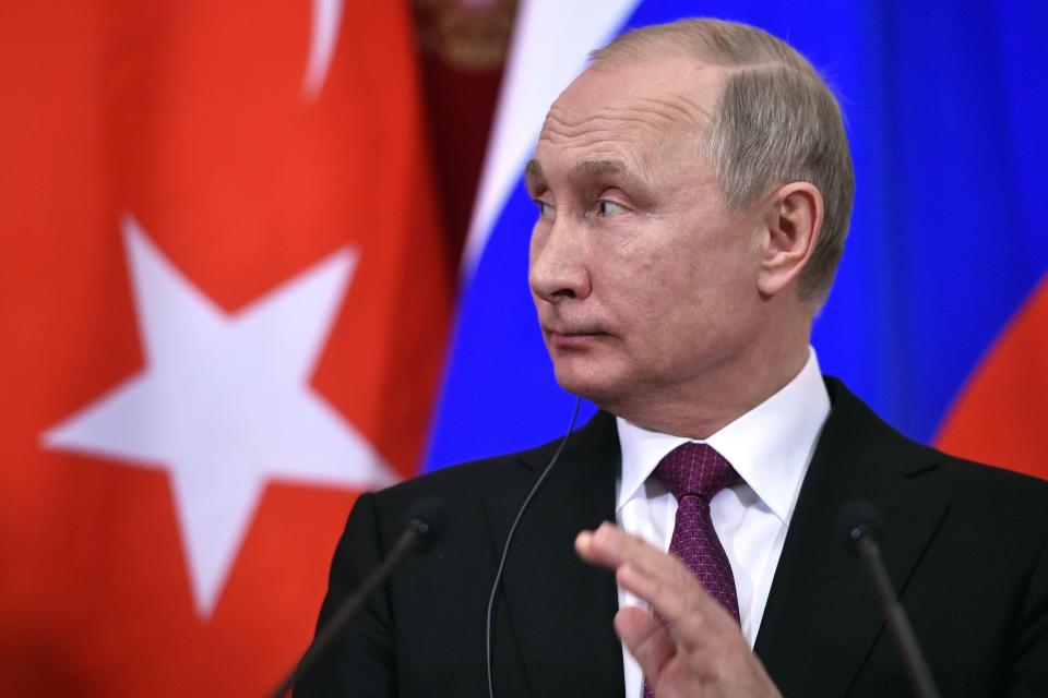 Russian President Vladimir Putin gestures during his and Turkey's President Recep Tayyip Erdogan joint news conference following talks in the Kremlin in Moscow, Russia, Wednesday, Jan. 23, 2019. Russia and Turkey are jockeying for clout in Syria as the U.S. plans to withdraw its troops from the country. (Alexander Nemenov/Pool Photo via AP)