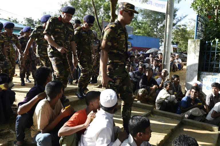 Chief of Army of Bangladesh, General Shafiul Huq (3R), visits the government's office for the registration of recently arrived Rohingya refugees in Ukhiya on September 21, 2017