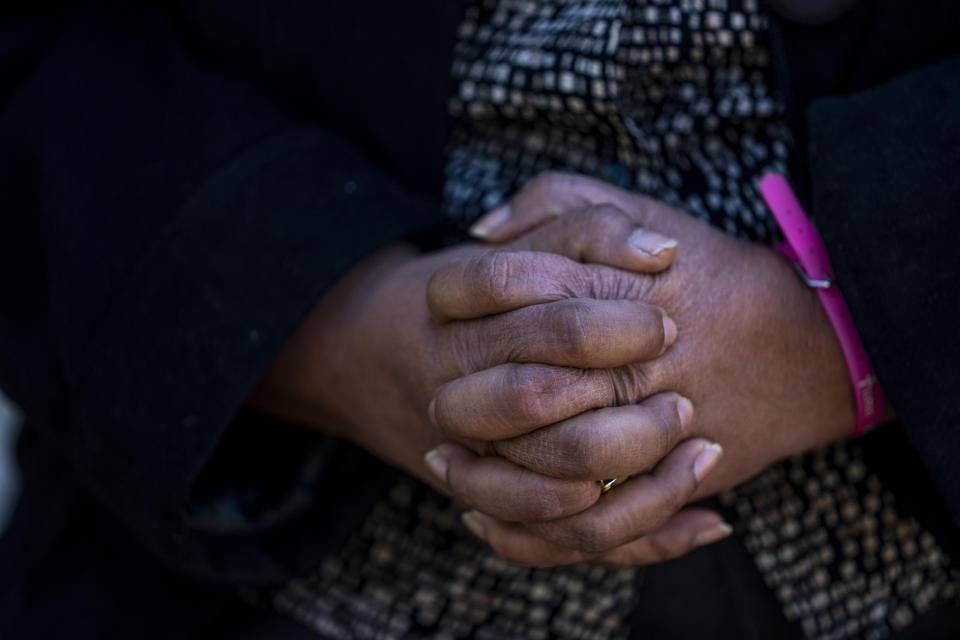 The hands of the President of the opposition-controlled National Assembly of Venezuela Dinorah Figuera are pictured during and interview with the Associated Press in Valencia, southeast Spain, Thursday, Jan. 12, 2023. Figuera's selection this month as part of an all-female leadership team of former backbench lawmakers was initially celebrated as an overdue acknowledgement of the key, grassroots role women like her have have played in the two decade fight against Maduro's socialist revolution. (AP Photo/Manu Fernandez)