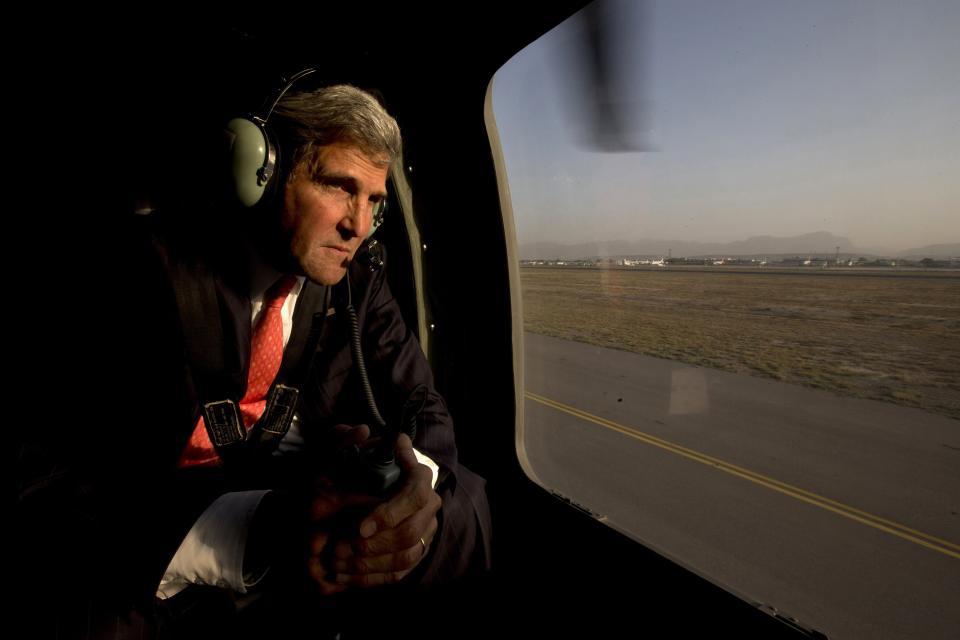 U.S. Secretary of State John Kerry takes off in a black hawk helicopter after arriving for an unannounced visit in Kabul October 11, 2013. Kerry arrived in Afghanistan on Friday to advance negotiations with President Hamid Karzai on a bilateral security pact which have hit a wall over two issues that have become deal breakers for the Afghan government. REUTERS/Jacquelyn Martin/Pool (AFGHANISTAN - Tags: POLITICS TRANSPORT)