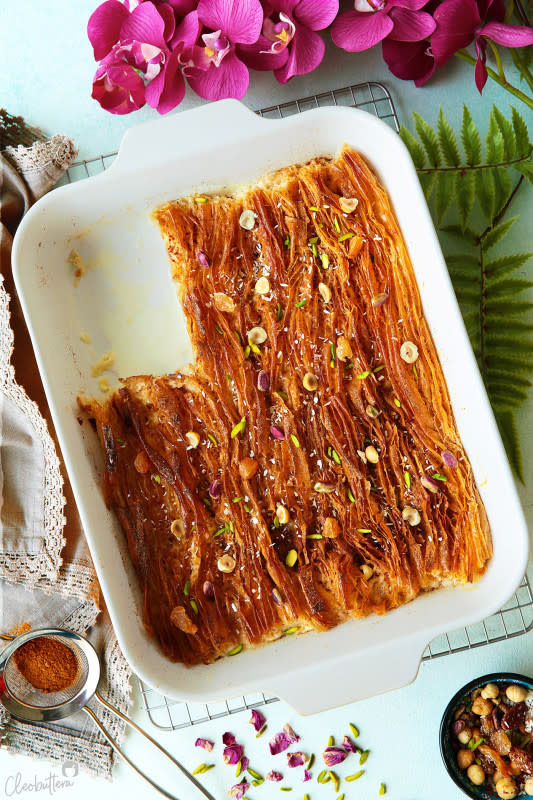 <p>Cleobuttera</p><p>Pleated sheets of phyllo dough, soaked and flavored with a luscious combination of sweetened condensed milk and cream, topped with puffs of ground cinnamon and a sprinkle of nuts. Crisp on the outside, creamy on the inside, it's simply one of the best and easiest desserts you will ever make!</p><p><strong>Get the recipe: <a href="https://cleobuttera.com/middle-eastern/mesh-om-ali-phyllo-milk-pie/" rel="nofollow noopener" target="_blank" data-ylk="slk:Phyllo Milk Pie (Mesh Om Ali);elm:context_link;itc:0;sec:content-canvas" class="link ">Phyllo Milk Pie (Mesh Om Ali)</a></strong></p>