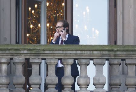 Alexander Dobrindt of the Christian Social Union of Bavaria (CSU) is seen on the balcony of German Parliamentary Society offices during the exploratory talks about forming a new coalition government held by CDU/CSU in Berlin, Germany, October 18, 2017. REUTERS/Hannibal Hanschke