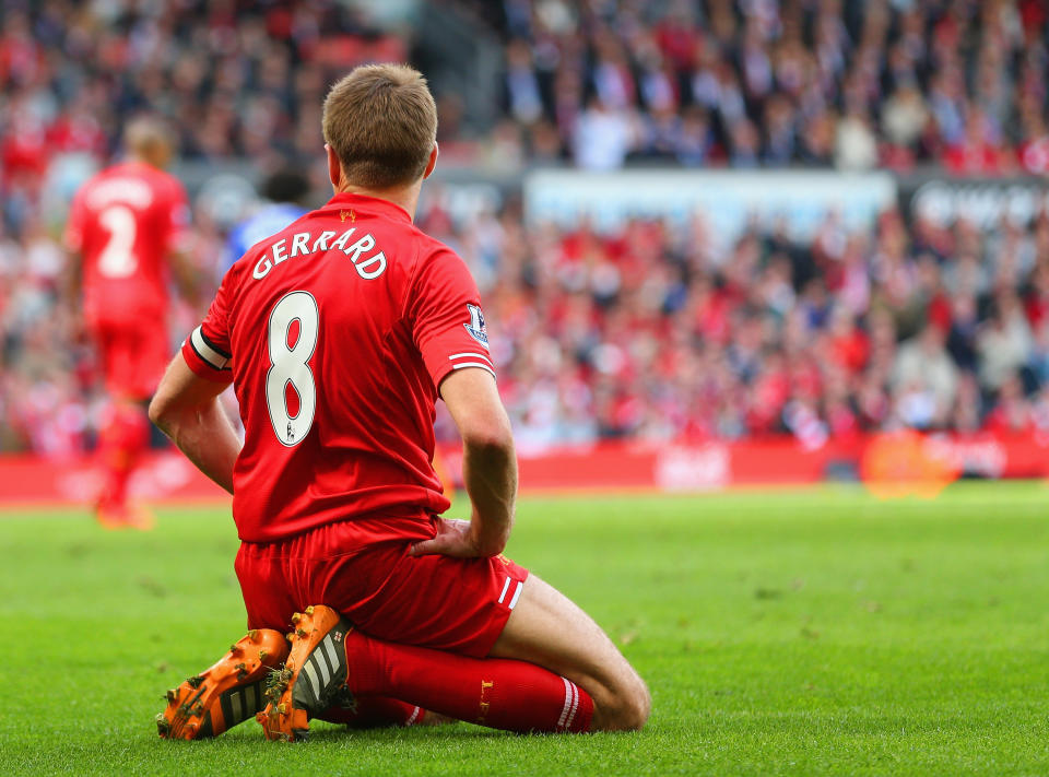 Gerrard on his knees after slipping at Anfield. Photo by Clive Brunskill/Getty Images