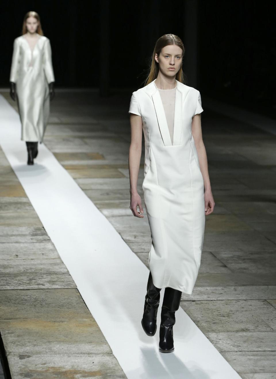 A model walks the runway during the Theyskens Theory Fall 2013 runway show at Fashion Week in New York, Monday, Feb. 11, 2013. (AP Photo/Kathy Willens)