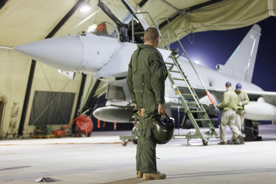 This photo issued by the Ministry of Defence (MOD) on Sunday, Feb. 4, 2024 shows a RAF Typhoon FGR4 aircraft back at the base, following strikes against Houthi targets in Yemen. The U.S. and Britain struck 36 Houthi sites in Yemen in a second wave of assaults meant to further disable Iran-backed groups that have relentlessly attacked American and international interests in the wake of the Israel-Hamas war. In addition to the strikes on Saturday, U.S. Central Command says it conducted an additional “self-defense” strike on Sunday against a Houthi anti-ship cruise missile. (AS1 Jake Green/RAF via AP)