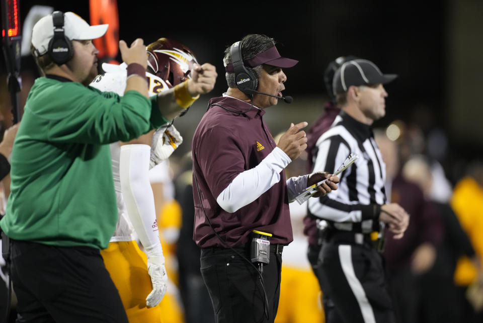 Arizona State interim head coach Shaun Aguano, center, difrects his players against Colorado in the second half of an NCAA college football game Saturday, Oct. 29, 2022, in Boulder, Colo. (AP Photo/David Zalubowski)