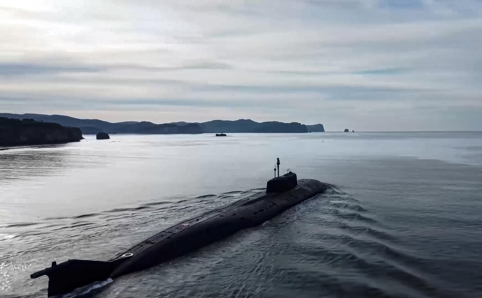 In this handout photo taken from video released by Russian Defense Ministry Press Service on Friday, April 14, 2023, A Russian nuclear submarine sails off to take part in the Pacific Fleet drills near Vladivostok, Russia. Russian Defense Minister Sergei Shoigu announced that the entire Russian Pacific Fleet was put on high alert on Friday for snap drills that will involve practice missile launches in a massive show of force amid the tensions with the West over the fighting in Ukraine. (Russian Defense Ministry Press Service via AP)