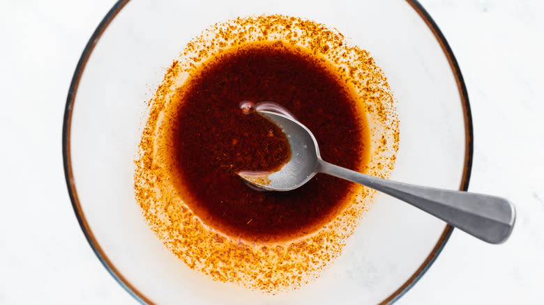 Spicy marinade in mixing bowl