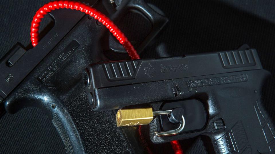 PHOTO:A Diamondback .380 semi-auto with a trigger lock (right) and a Glock Model 22 with a gun lock installed (left) at Black Gold Guns & Ammo, Aug. 3, 2016, in Houston. (Houston Chronicle via Getty Images)