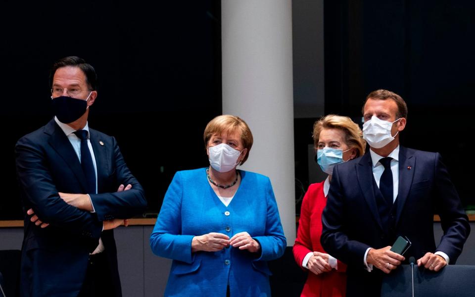 From left: Mark Rutte with Angela Merkel, Ursula von der Leyen, the president of the European Commission, and Mr Macron at the summit.  - AFP