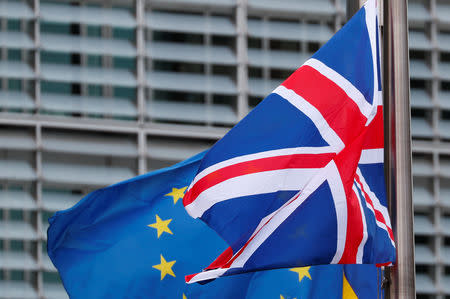 The Union Jack and the European Union flags fly outside the European Commission headquarters in Brussels, Belgium February 7, 2019. REUTERS/Francois Lenoir