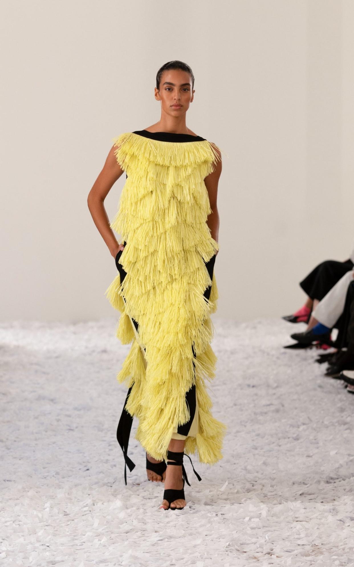 16Arlington's canary yellow tassel dress really grabbed the audience's attention and imagination