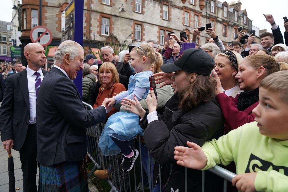 King Charles III greets members of the public after an official council meeting at the City Chambers in Dunfermline, Fife, to formally mark the conferral of city status on the former town on October 3, 2022 in Dunfermline, Scotland.