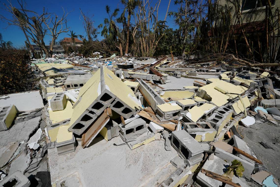 Destroyed homes are seen on Sanibel Island, in the aftermath of Hurricane Ian, Friday, Sept. 30, 2022, on Sanibel Island, Fla. (AP Photo/Steve Helber)