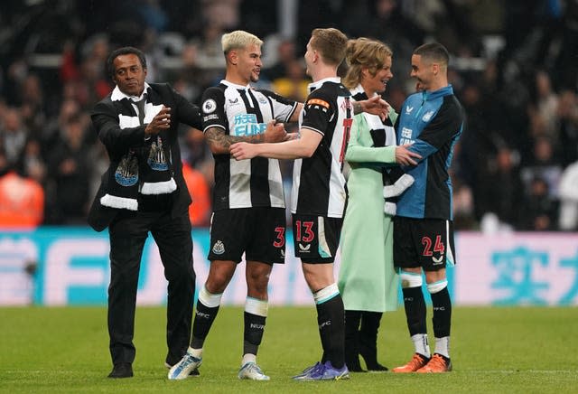 Bruno Guimaraes (second left) and Matt Targett celebrate