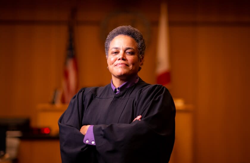 OAKLAND, CA - AUGUST, 22, 2022 - Alameda County Superior Court Judge Kelli Evans stands for a photo in her courtroom in Oakland, California on August 22, 2022. Judge Evans has been nominated to the California Supreme Court by Gov. Newsom, and will be the first lesbian justice when confirmed. (Josh Edelson/for the Times)