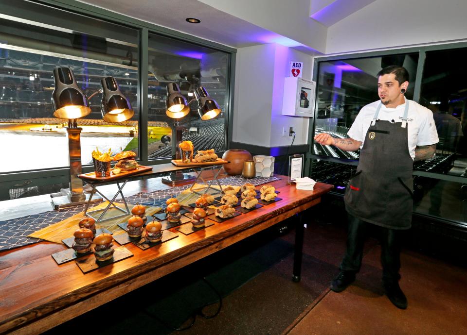 Milwaukee Brewers Executive Chef Adam Miller describes food items as the Milwaukee Brewers unveil 'Restaurant To Be Named Lateru0022 in March 2020. The restaurant took the place of the former Friday's restaurant at Miller Park.