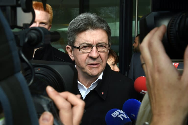 French presidential election candidate for the far-left coalition La France insoumise Jean-Luc Melenchon visits the library of the Lille 1 University in Villeneuve-d'Ascq, northern France, on April 11, 2017, as part of a campaign visit