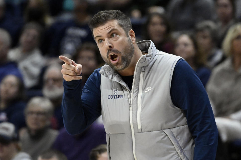 Butler head coach Austin Parkinson calls out to his team in the first half of an NCAA college basketball game against UConn, Saturday, Jan. 21, 2023, in Storrs, Conn. (AP Photo/Jessica Hill)