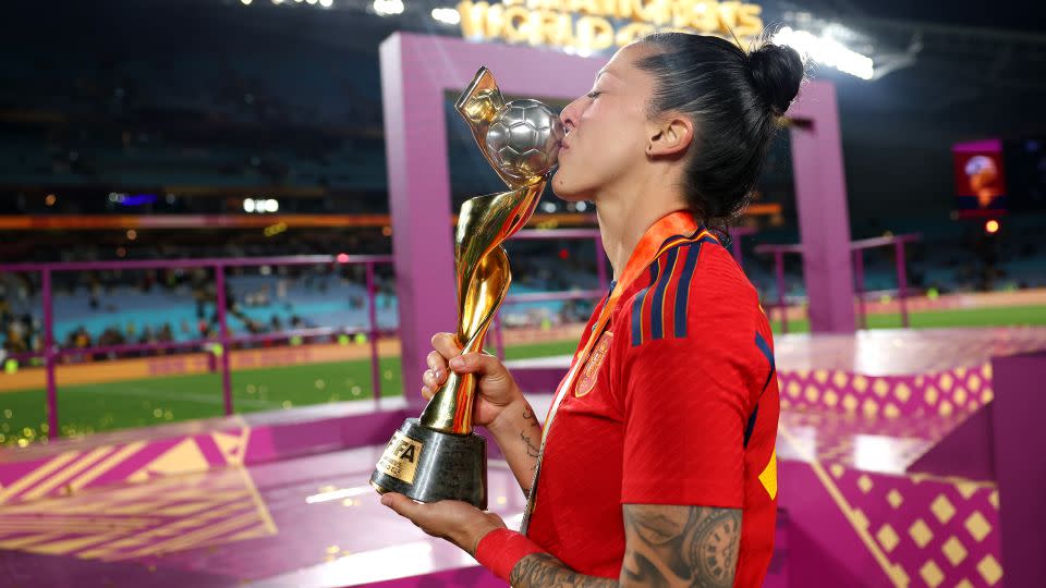 Jennifer Hermoso kisses the Women's World Cup trophy. - Maja Hitij/FIFA/Getty Images