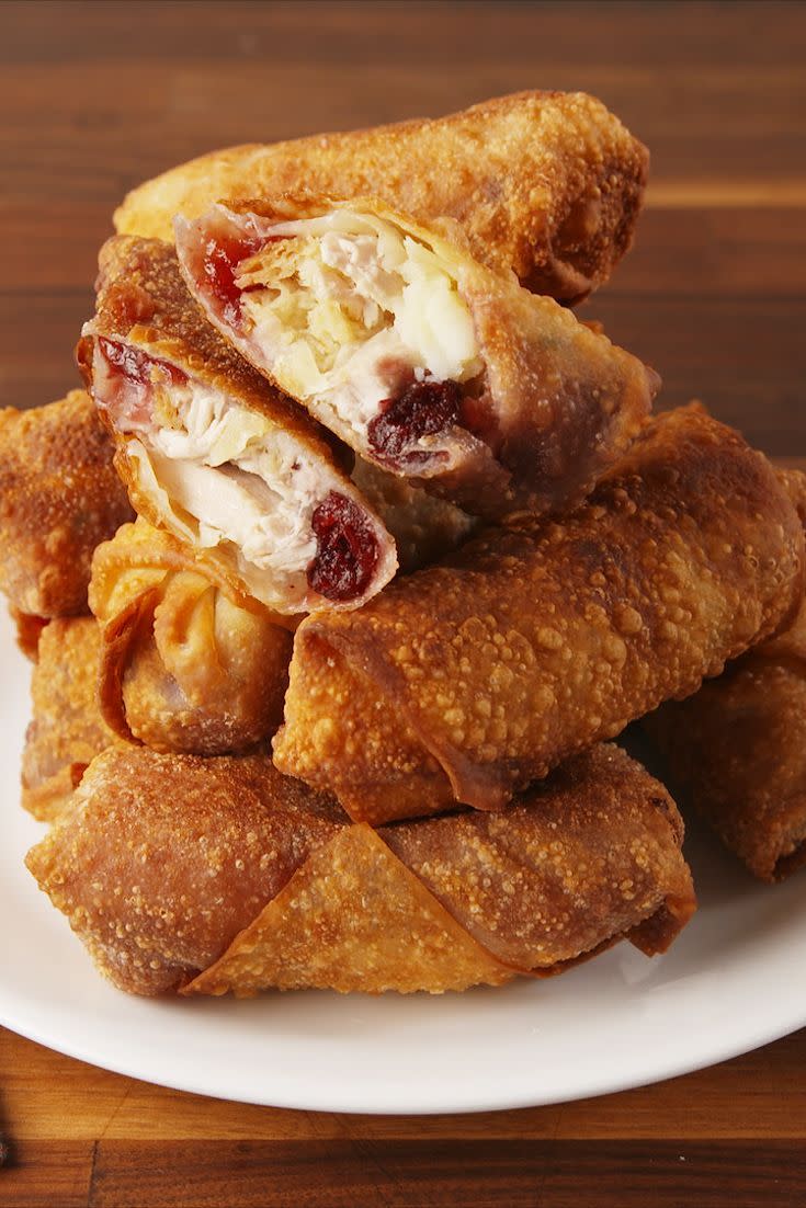 <p>Leftovers have never been so exciting now that you can stuff all those potatoes, turkey, stuffing, and cranberry sauce in a crispy, crunchy <a href="https://www.delish.com/cooking/recipe-ideas/a37639826/air-fryer-egg-rolls-recipe/" rel="nofollow noopener" target="_blank" data-ylk="slk:egg roll;elm:context_link;itc:0;sec:content-canvas" class="link ">egg roll</a> wrapper. Serve these with gravy for one of the most ingenious uses for leftovers EVER. <br><br>Get the <strong><a href="https://www.delish.com/cooking/recipe-ideas/recipes/a56769/thanksgiving-egg-rolls-recipe/" rel="nofollow noopener" target="_blank" data-ylk="slk:Thanksgiving Egg Rolls recipe;elm:context_link;itc:0;sec:content-canvas" class="link ">Thanksgiving Egg Rolls recipe</a></strong>.</p>