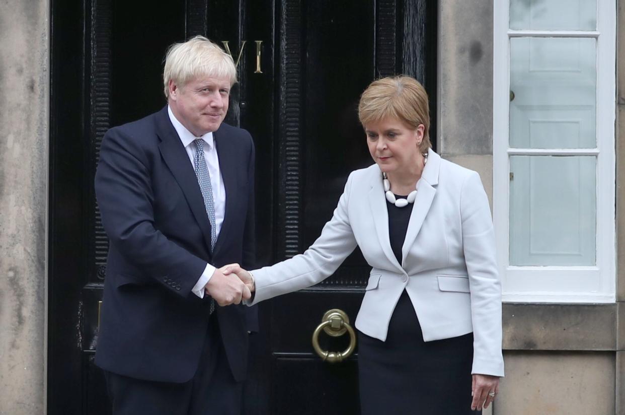 Nicola Sturgeon with Boris Johnson during a previous visit to Bute House (Jane Barlow/PA) (PA Archive)