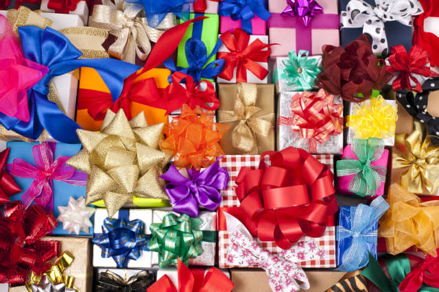 many colorful gift boxes with...