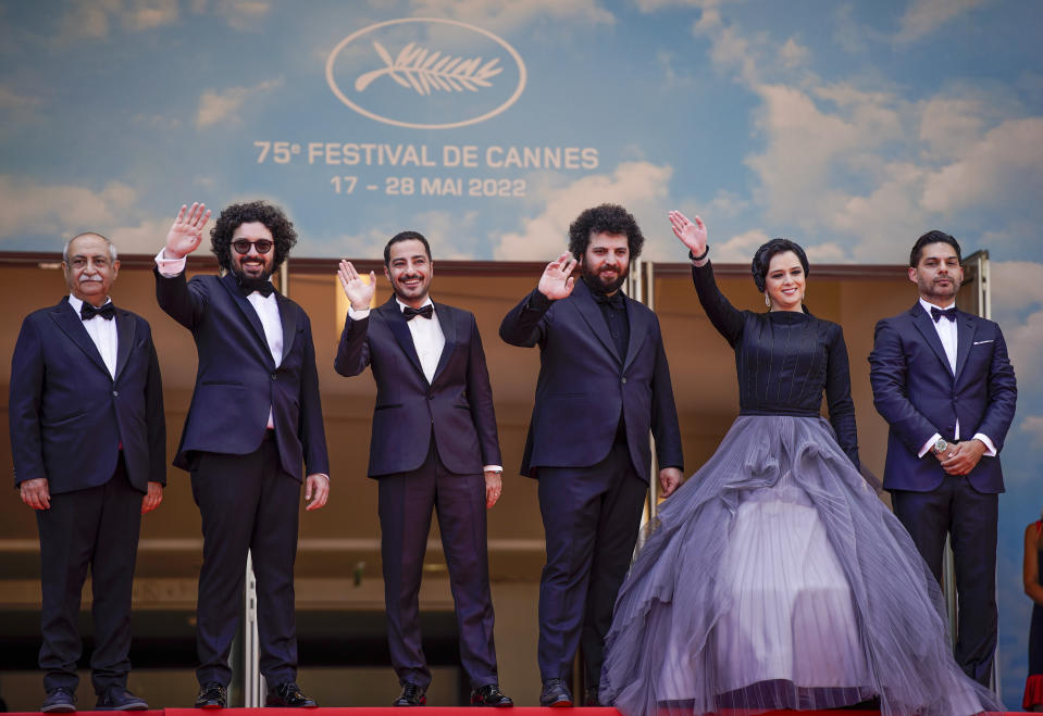 FILE - Bahram Dehghani, from left, Hooman Behmanesh, Navid Mohammadzadeh, director Saeed Roustayi, Taraneh Alidoosti, and Payman Maadi pose for photographers upon arrival at the premiere of the film 'Leila's Brothers' at the 75th international film festival, Cannes, southern France, Wednesday, May 25, 2022. Iranian authorities arrested Alidoosti, one of the country’s most famous actresses on charges of spreading falsehoods about nationwide protests that grip the country, state media said Saturday, Dec. 17. (AP Photo/Daniel Cole, File)