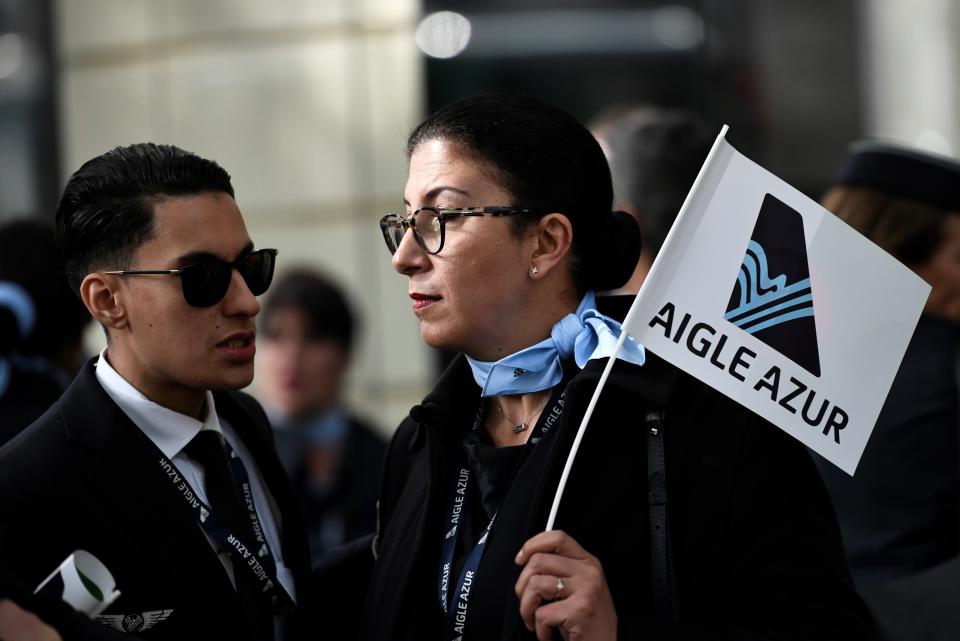 Employees of French airline Aigle Azur demonstrate outside French Transport ministry, on September 9, 2019 in Paris. - France's second-largest airline Aigle Azur, which went into receivership this week, plans to cancel all flights starting Friday night as it seeks a takeover bid to save the company, according to an internal document seen by AFP. (Photo by STEPHANE DE SAKUTIN / AFP)        (Photo credit should read STEPHANE DE SAKUTIN/AFP/Getty Images)