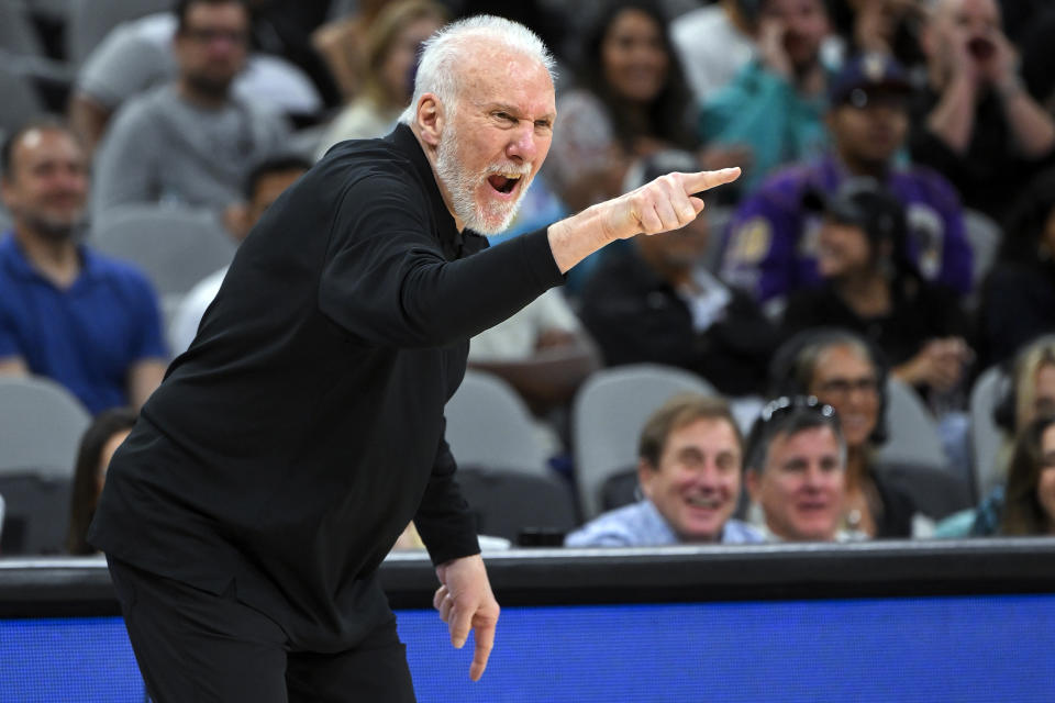 San Antonio Spurs head coach Gregg Popovich yells to his players during the second half of an NBA basketball game against the Cleveland Cavaliers, Monday, Dec. 12, 2022, in San Antonio. San Antonio won 112-111. (AP Photo/Darren Abate)