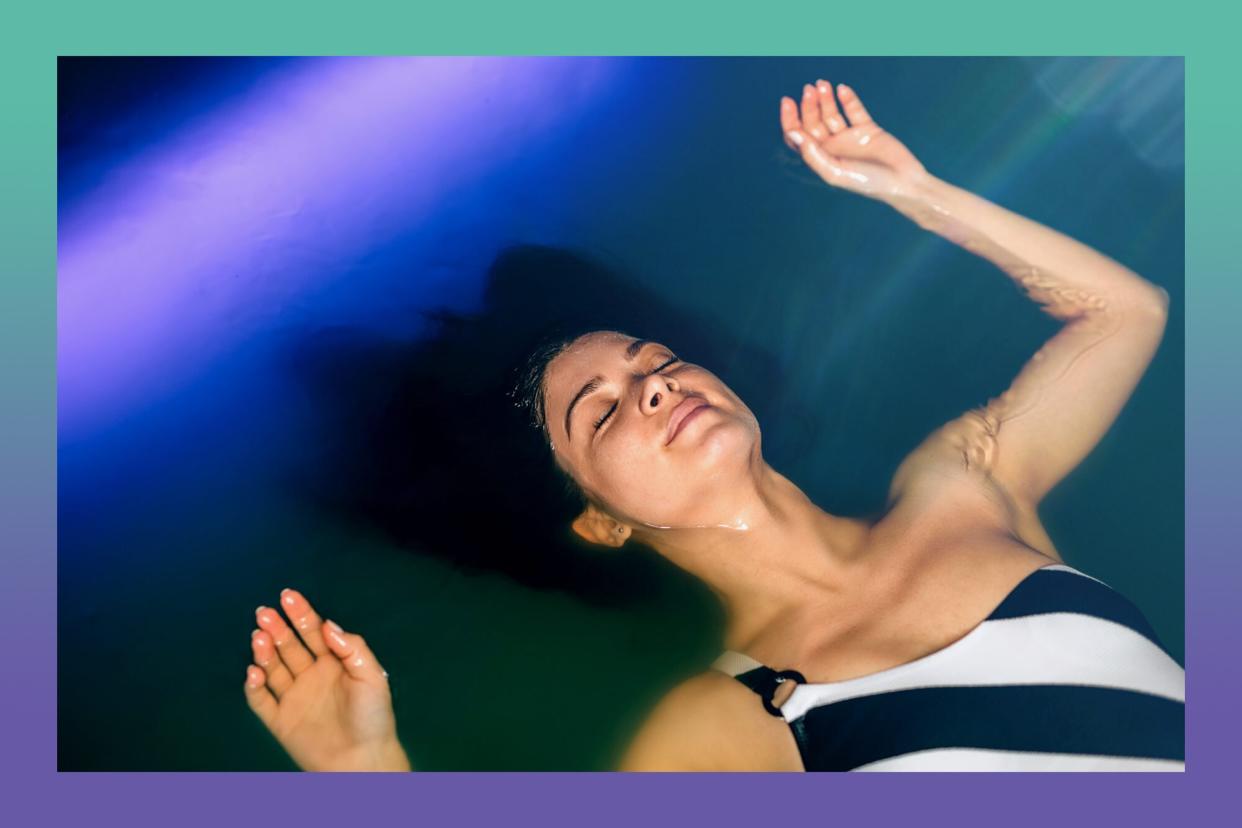 woman floating in dense salt water