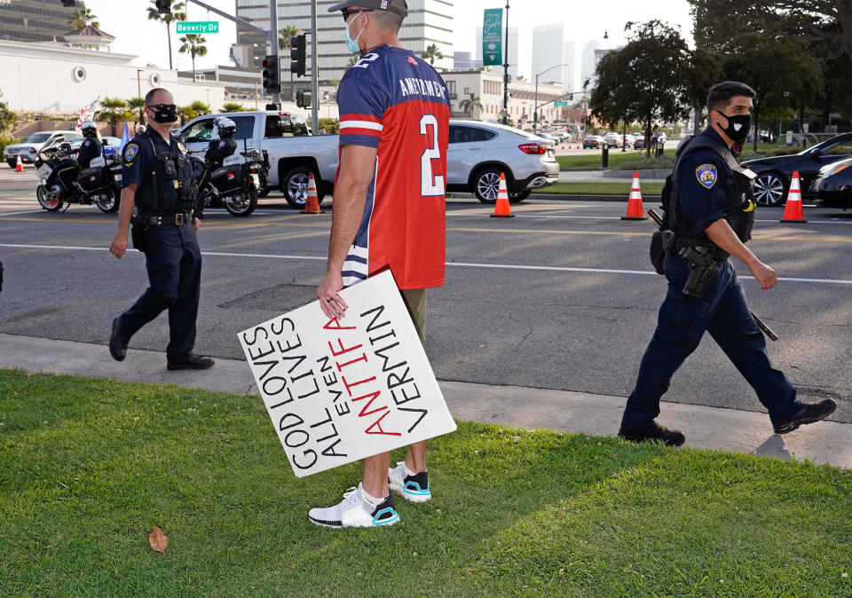 A man with an anti-antifa sign at a Trump rally in Beverly Hills, Calif., Oct. 10, 2020,<span class="copyright">Jamie Lee Curtis Taete</span>