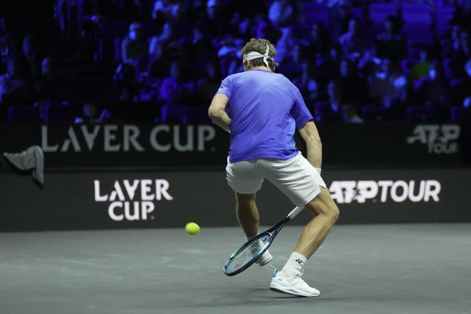 Team Europe's Casper Ruud returns a ball to Team World's Jack Sock during a match on day one of the Laver Cup tennis tournament at the O2 in London, Friday, Sept. 23, 2022. (AP Photo/Kin Cheung)