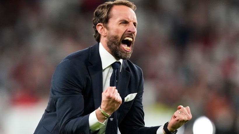 England coach Gareth Southgate shouts and clenches his fists